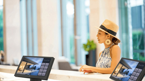 woman helping at desk
