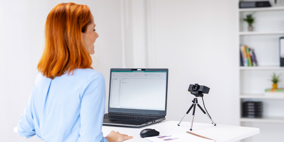 Woman using tw-350 webcam